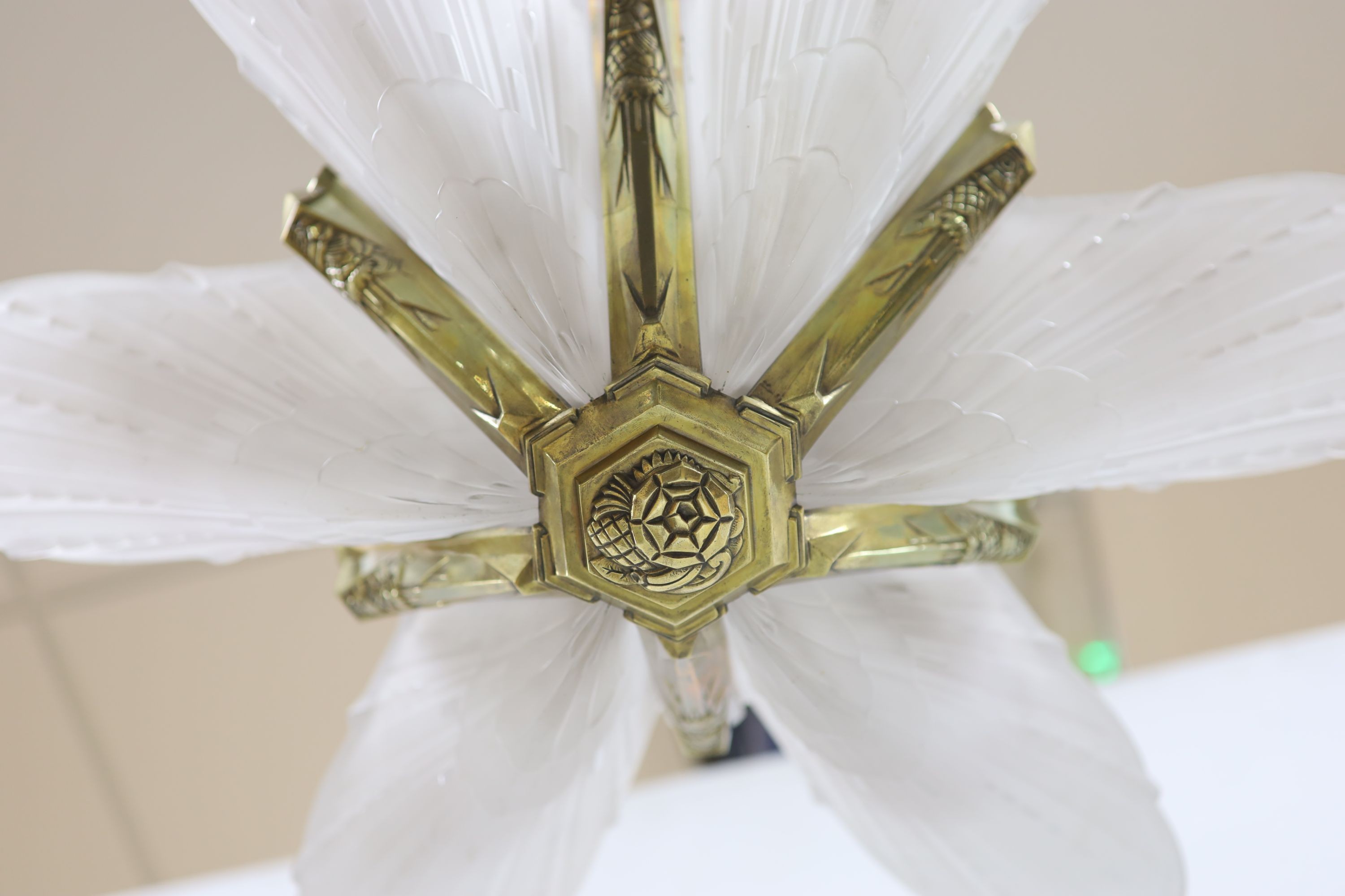 An Art Deco style large frosted glass and brass handing ceiling light 80cm drop